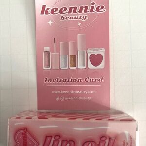 New in box Keennie shinning lip oil, shimmering lip oil with flattering shine